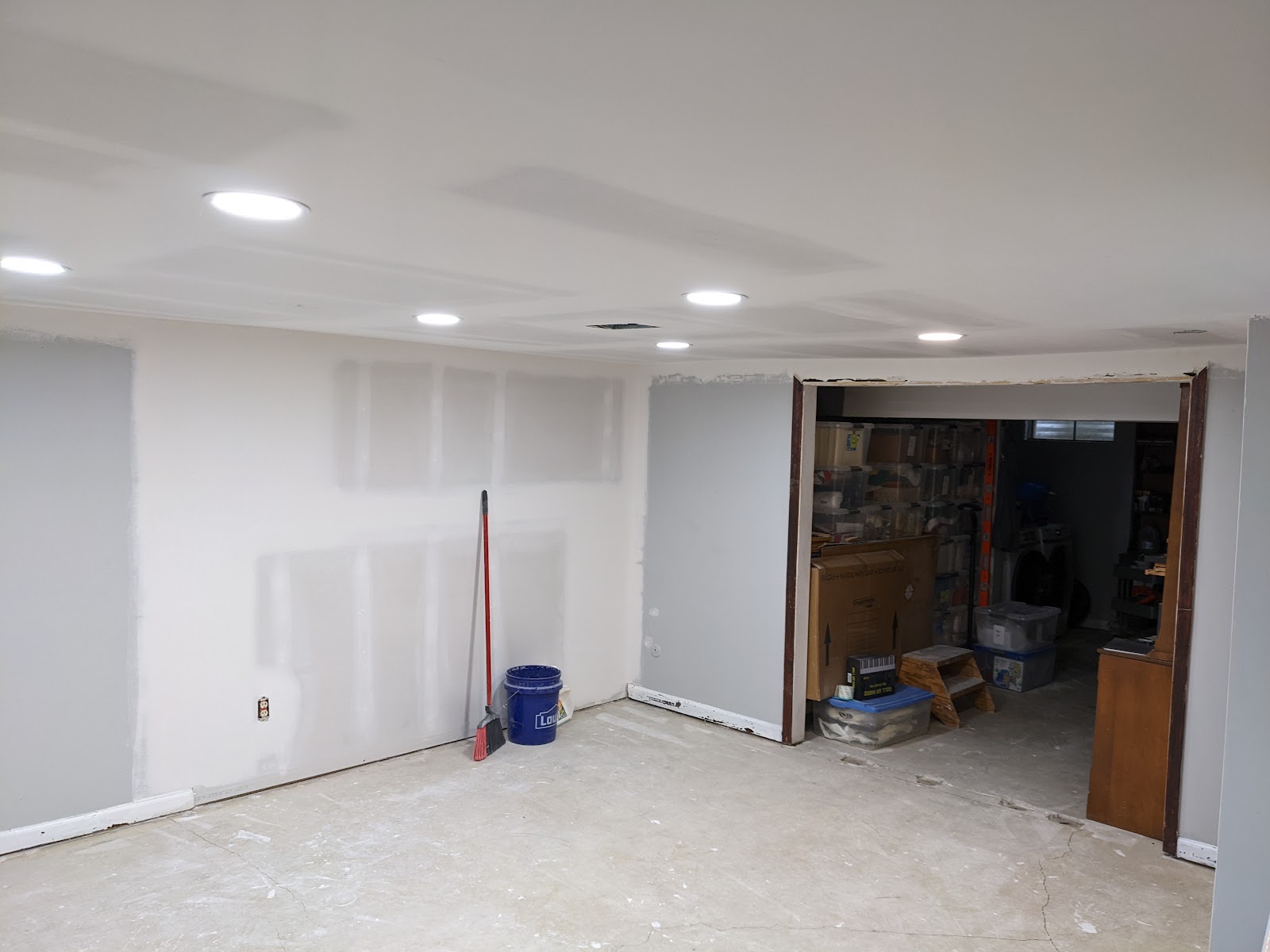 Finished basement rec room with smooth ceiling