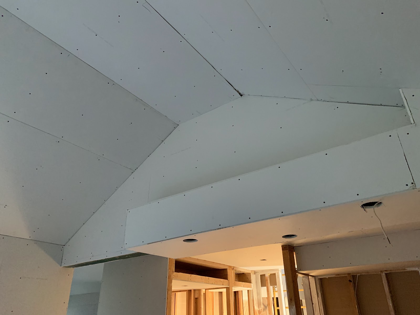 Garage drywall hung with recessed lighting